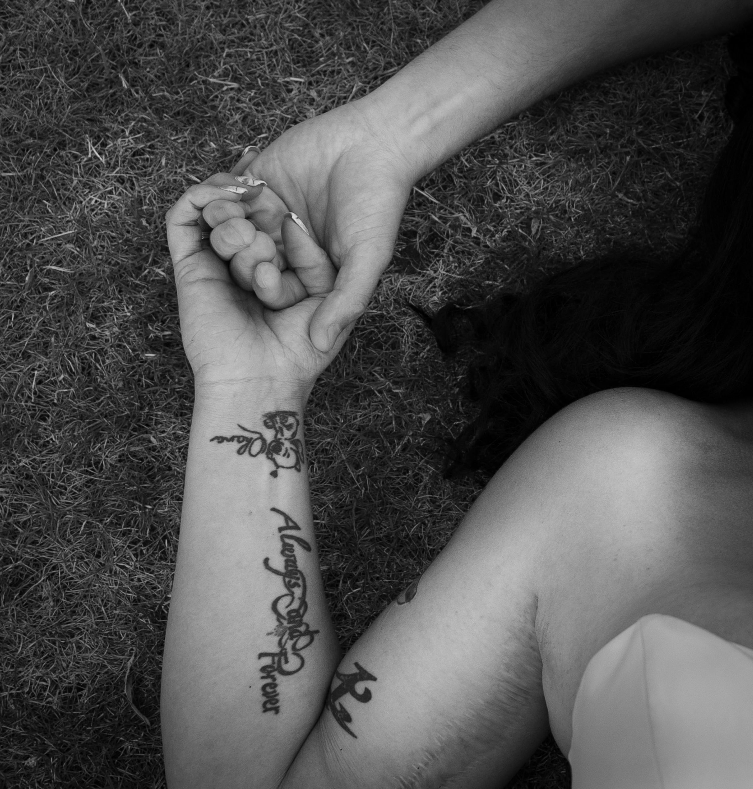 bride-and-groom holding hands in love