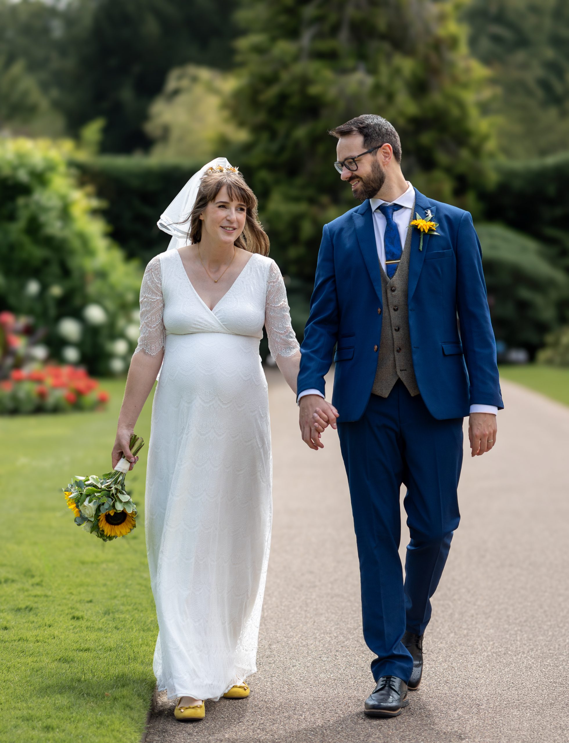 blossom-tree-wedding married couple taking a stroll in Abbey gardens
